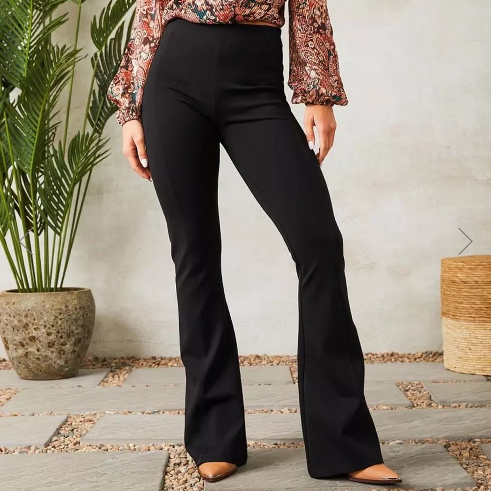 Black Shinestar Pants. Size small